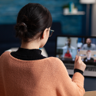 Woman watching webinar on laptop